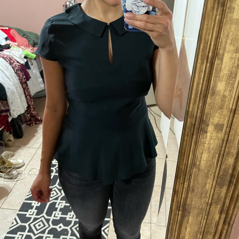 Express peplum top with keyhole opening